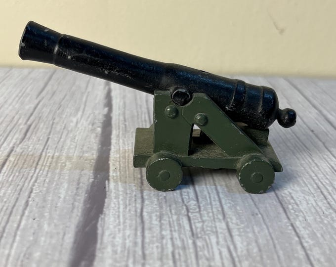 casted cannon paper weight