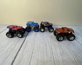 Set of 4 Hot Wheel Monster truck vehicles