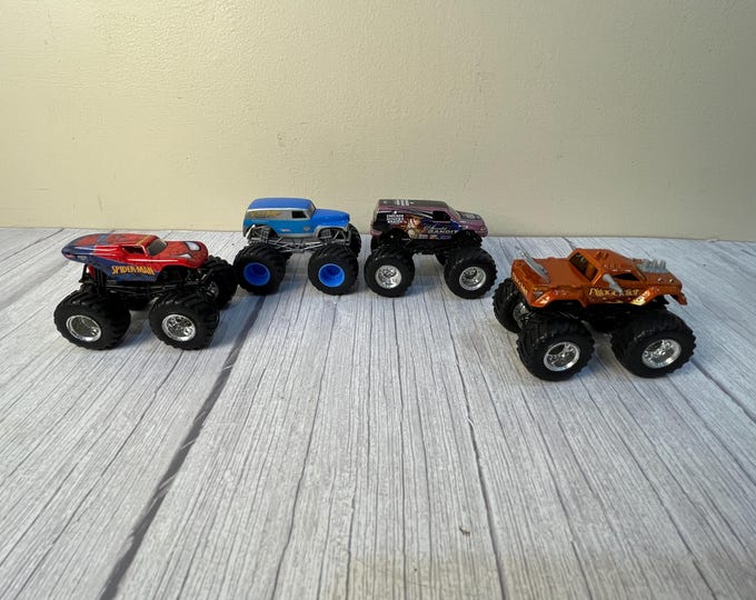 Set of 4 Hot Wheel Monster truck vehicles