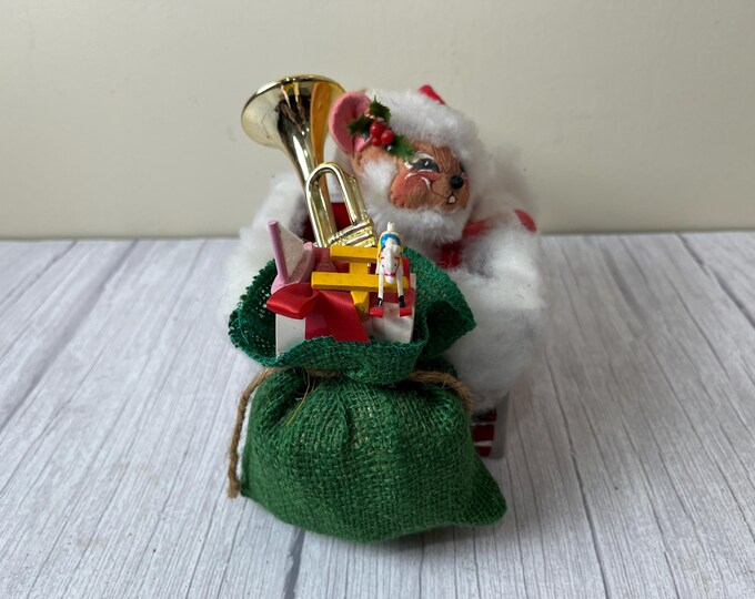 1995 Annalee mouse going down a chimney with bag of toys and a Tuba