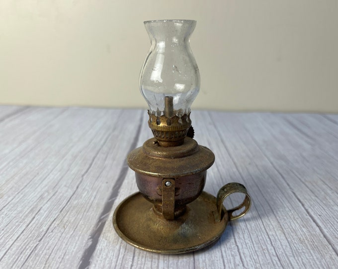 Miniature brass swivel finger oil lamp with clear chimney and wick