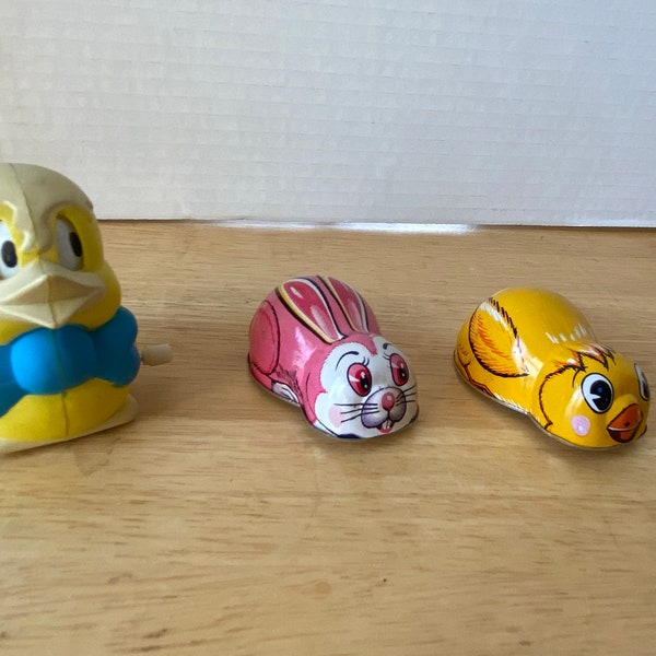 Set of 3 Vintage Easter Toys - Wind up rolling duck and Japan Tin Litho "K" Friction yellow chick and pink bunny cars