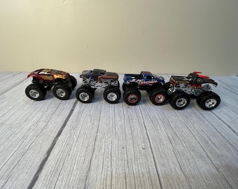 Set of 4 Hot Wheel Monster truck vehicles