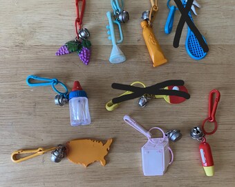 Set of 7 -1980s Bell Charms-Rare Flashlight Bell charm, Aqua Trumpet, Grape, Baby Bottle, Pink Washing Machine, Map of US & Orange Toothpast