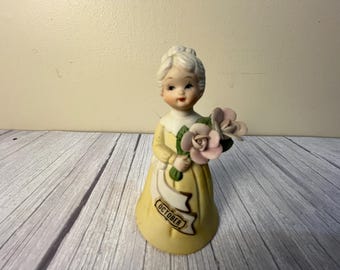 UCGU October Birthday Ceramic bell girl figurine