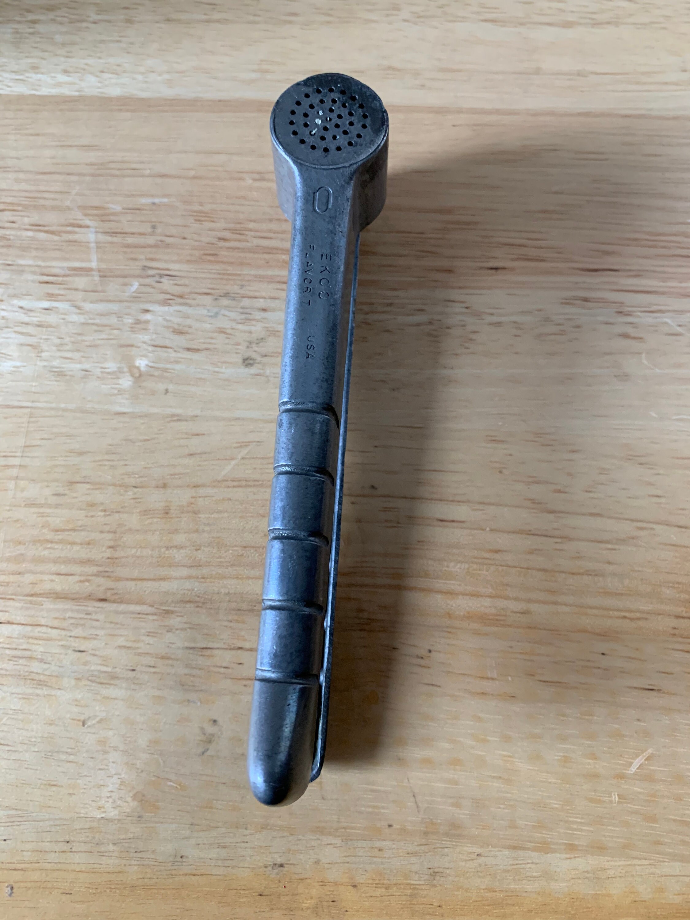 Vintage garlic press onion juicer from Ecko