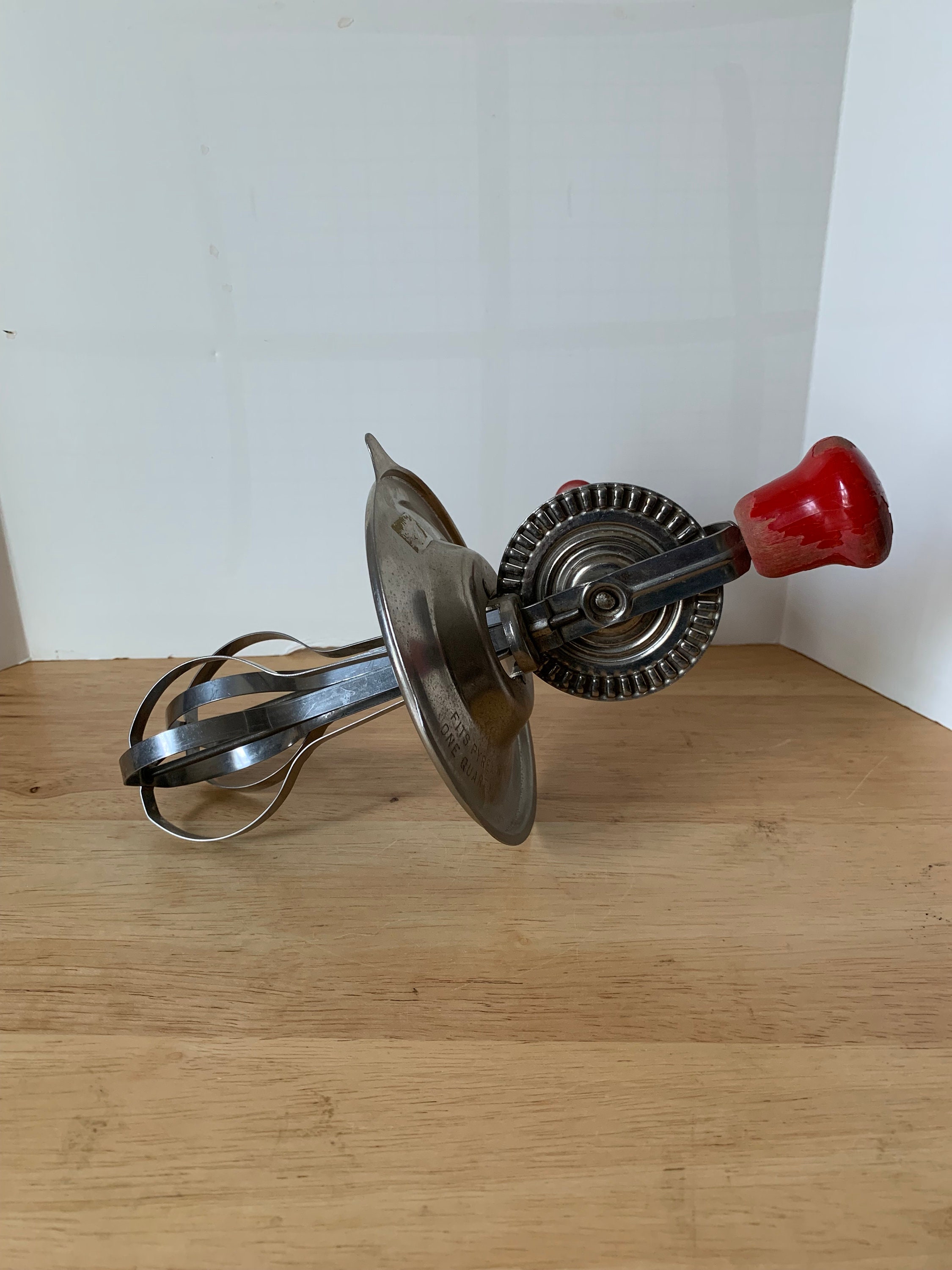 Vintage Androck hand mixer or egg beater with top