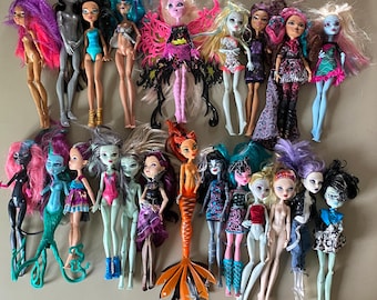 Set of 22 Monster High and Ever After High School Dolls and 27 Accessories, stands and booklet