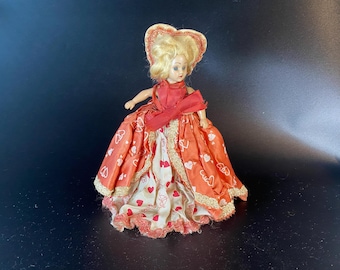 1948 Duchess Valentine Doll with Glass Blue Eyes with Cupid and Heart gown and tall Heart Shape back collar behind head