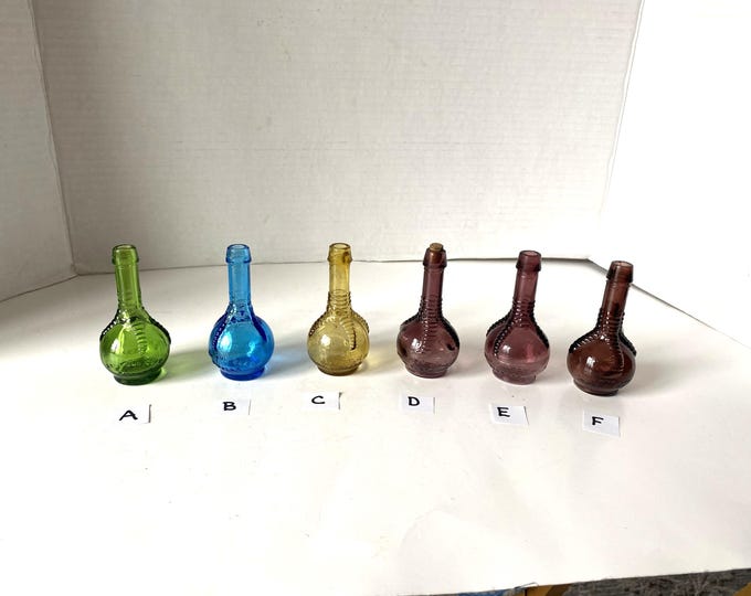 Small Wheaton Green Glass Ball and Claw Bottle and Blue, Gold, & Purple Ball and Claw Made in Taiwan glass bottles- some with corks