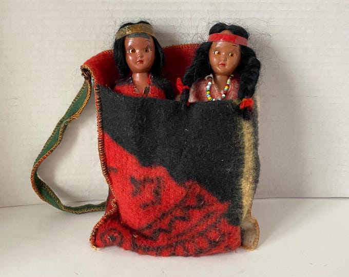 Set of 2 Sleepy Eyed Plastic Native American Indian Souvenir dolls in Felt Pouch