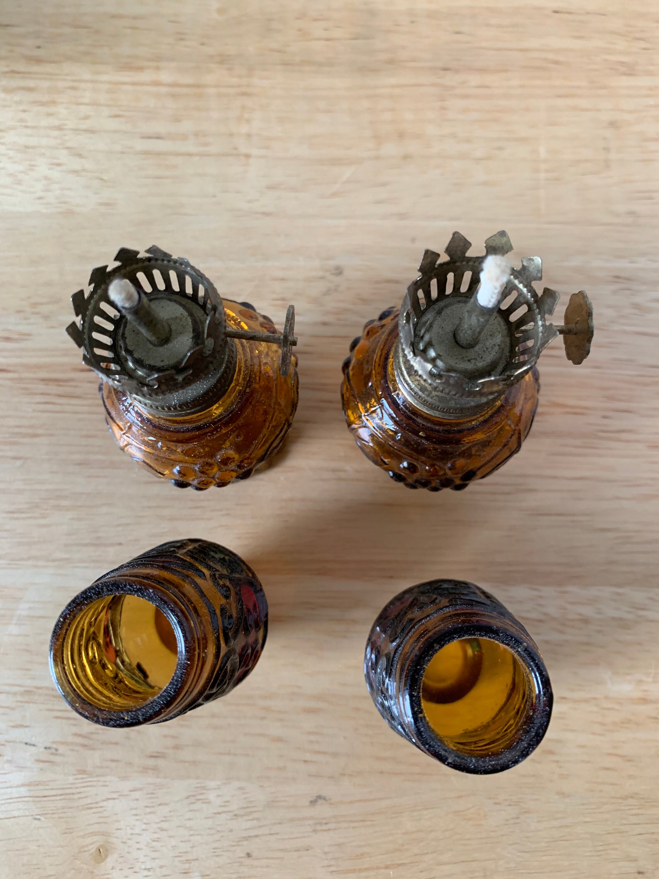 Vintage pair of brown glass oil lamps multi colored chimmneys with