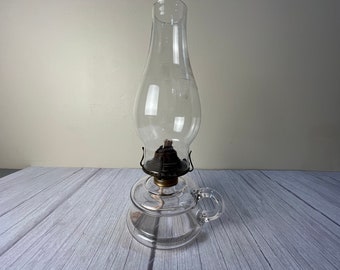 Vintage medium size double rim clear glass finger oil lamp with chimney and wick