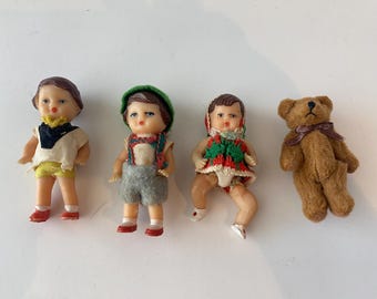 Set of 4-  Vintage Rubber 3" Dolls and Mini Teddy Bear