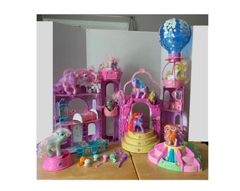 25+ Piece Set of My Little Pony Celebration Castle with Music and Flashing Lights including 11 My Little Pony Figurines and Accessories