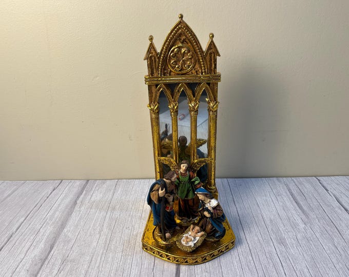 Vintage mirror back nativity scene with Mary, Joseph, Jesus and the divine angel in original box