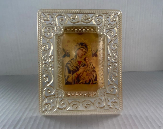 Vintage Small Picture of Our Lady of Perpetual Help framed in a clear plastic filigree frame.  For desktop or to hang on wall