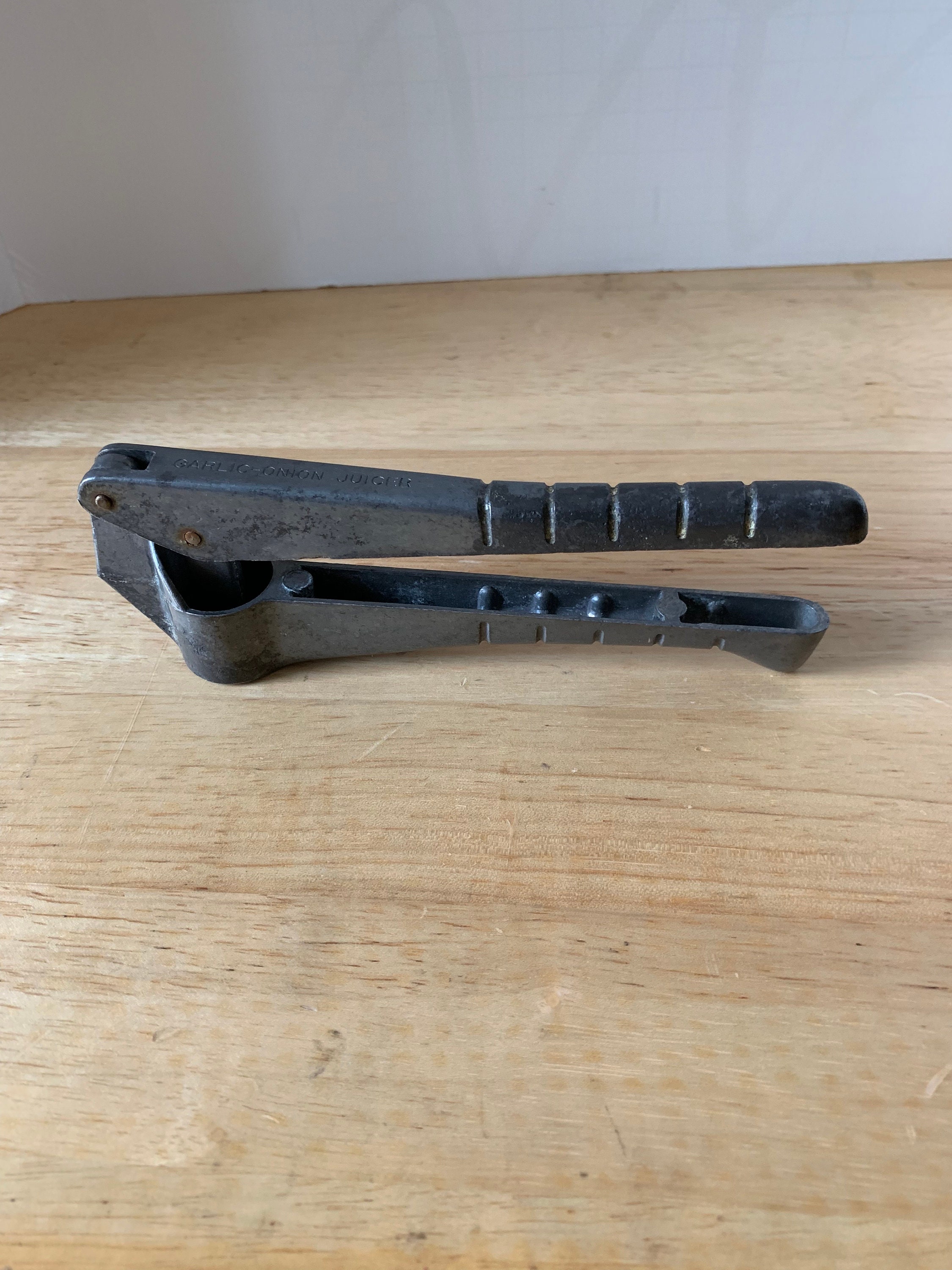 Vintage garlic press onion juicer from Ecko