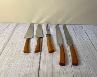 Choice 1940's Butterscotch Bakelite carving knives, serving fork, pie servers