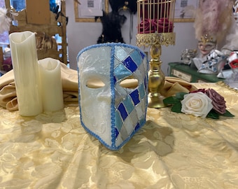 Bauta mask in papier-mâché and baroque decorations