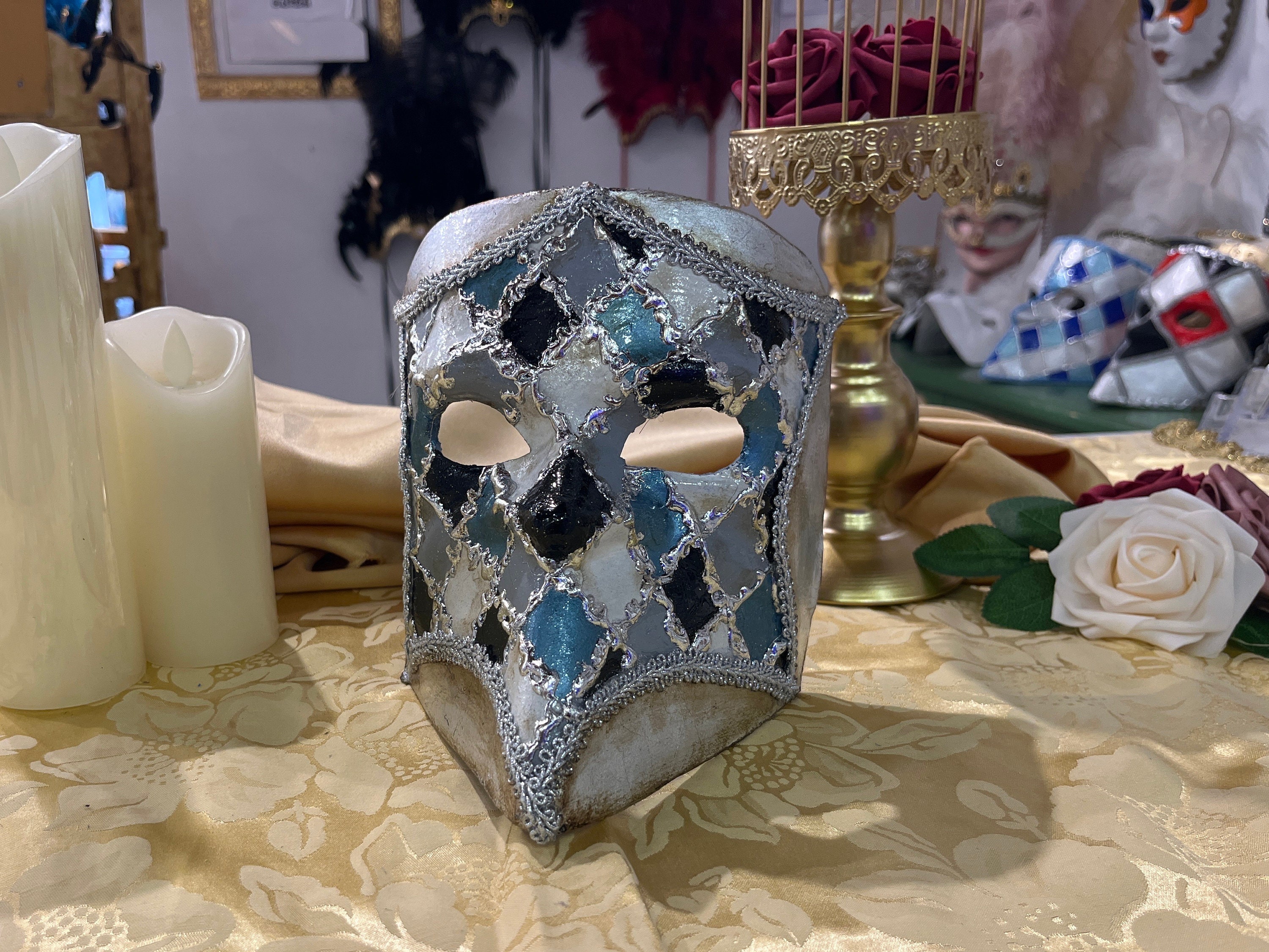 Bauta mask in papier-mâché and baroque decorations