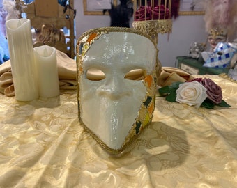 Bauta mask in papier-mâché and baroque decorations