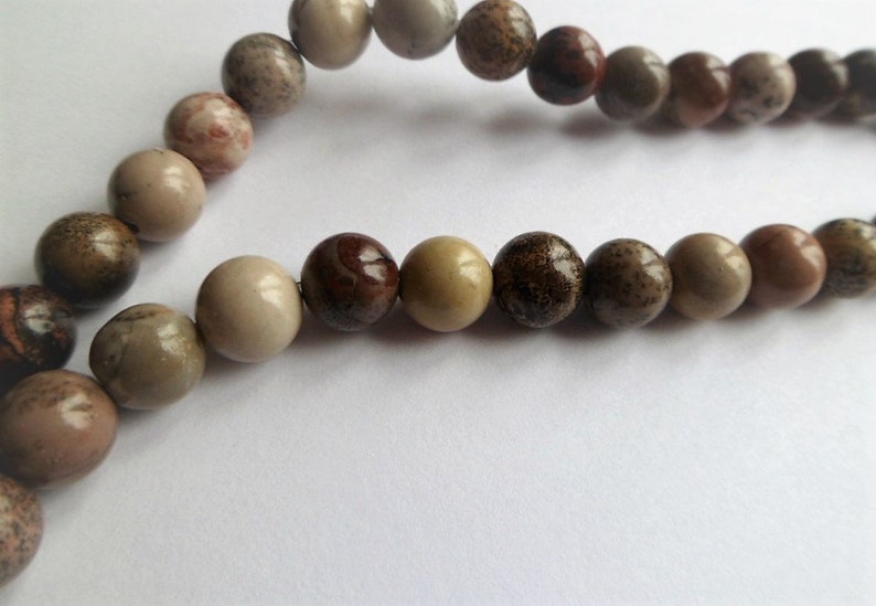 Round bead dendritic in Jasper
