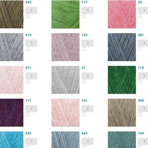 Puede incluir: Una carta de colores de muestras de hilo con n&uacute;meros correspondientes. Los colores incluyen verde, rosa, gris, azul, marr&oacute;n y morado.