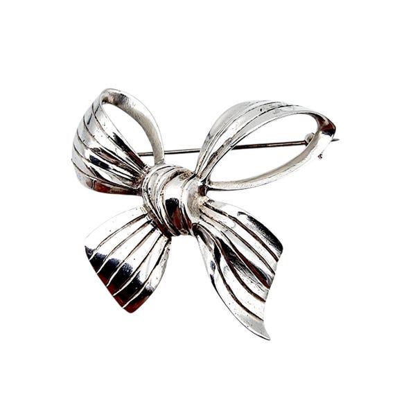 Elegant Silver Bow Brooch Amazon.com: Rhinestone Bow Brooch Pin for Women Long Tassel  main image 2