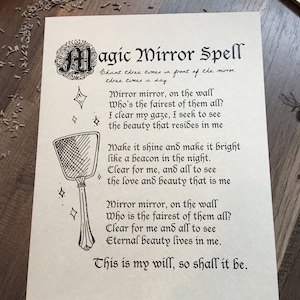 May include: A printable spell for a magic mirror. The text reads "Magic Mirror Spell" and includes instructions to chant the spell three times in front of the mirror, three times a day. The spell is written in a decorative font and includes a hand-drawn illustration of a mirror.
