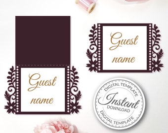 Pode incluir: Um modelo digital para um cartão de lugar de casamento com fundo bordô e design floral em preto e branco. O texto "Nome do convidado" está escrito em letras douradas. O modelo está disponível para download instantâneo.