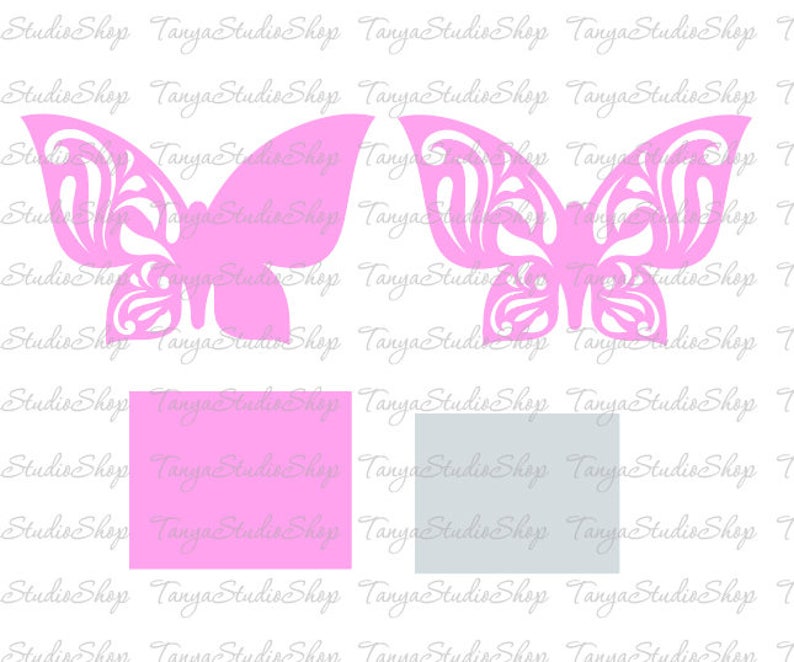 May include: Two pink butterfly-shaped cutouts with intricate designs. The butterflies are on a white background with a pink and a gray square below them.