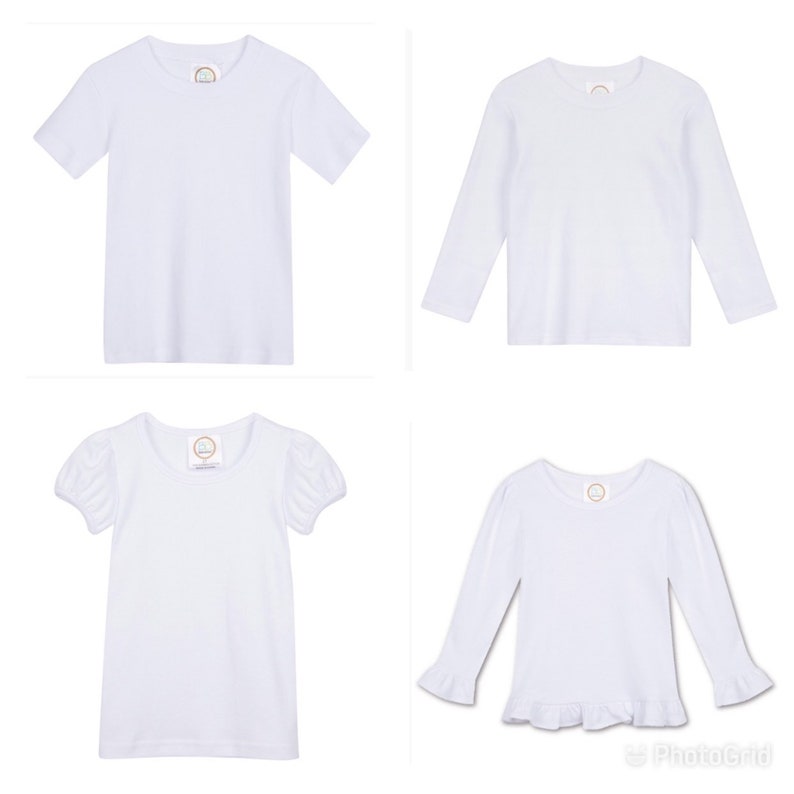 May include: Four white t-shirts for kids. Two short-sleeved t-shirts and two long-sleeved t-shirts. One long-sleeved t-shirt has a ruffle trim.