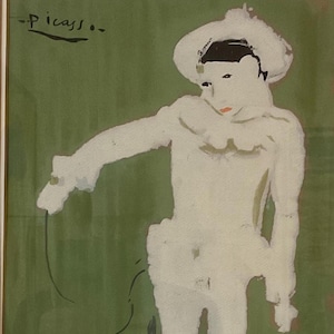 May include: A white figure in a white hat stands against a green background. The figure is painted in a stylized manner, with the artist's signature "Picasso" visible in the top left corner.