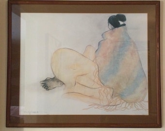 May include: A framed watercolor painting of a person sitting with their back to the viewer, wearing a colorful shawl with fringed edges. The painting is signed "McGuire" in the bottom left corner.