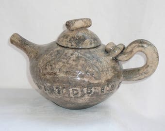 Decorative tea in handcrafted ceramic RAKU manganese oxide enamel, raku faience