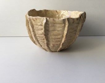 Cut shape beige ceramic bowl