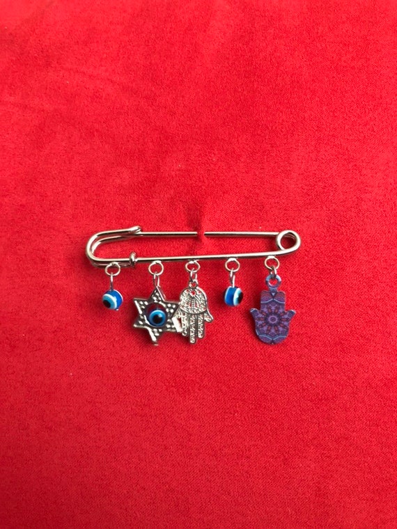Jewish Charms Gold Baby Safety Pin in 14K Gold | Izakov Fine  Jewish stroller evil eye protection pin display picture 1