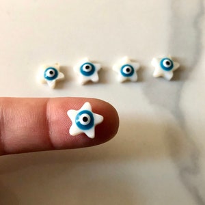 Evil eye charm, horse eye charm, Turkish evil eye charm, double connector, Jewish charm, shell beads, star charm, mother of pearl , sea star