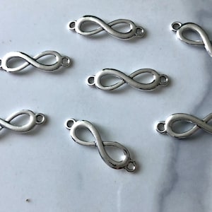 Tiny Infinity charm, infinity bracelet connector, jewelry making, jewelry findings, infinity pendant, DIY jewelry, bulk order, eternity sign