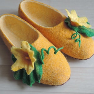 Yellow felt slippers with pumpkin flower