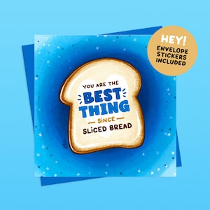 May include: Greeting card with a blue background and a slice of bread illustration. The text on the bread reads "YOU ARE THE BEST THING since SLICED BREAD." A yellow circle with the text "HEY! ENVELOPE STICKERS INCLUDED" is in the upper right corner.