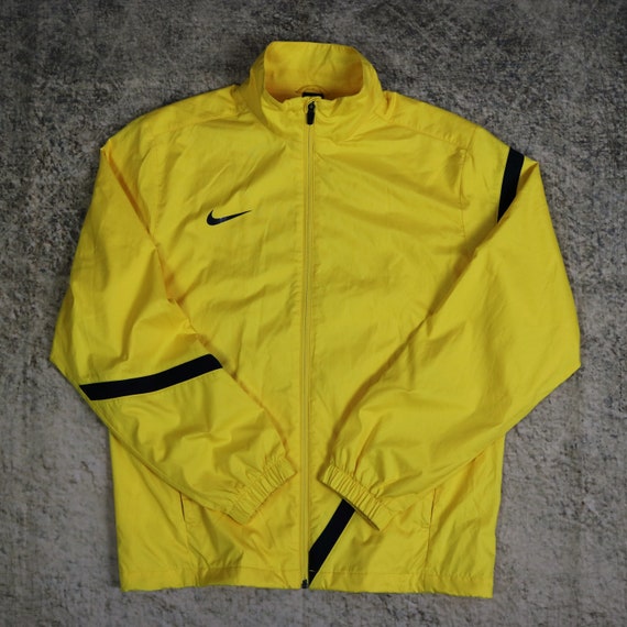 black and yellow nike windbreaker
