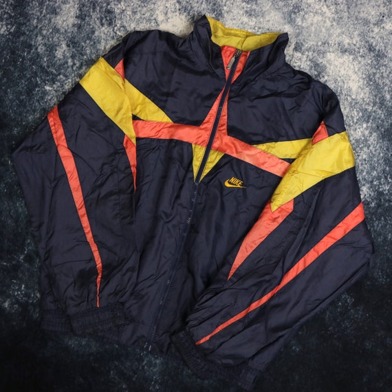 orange nike check