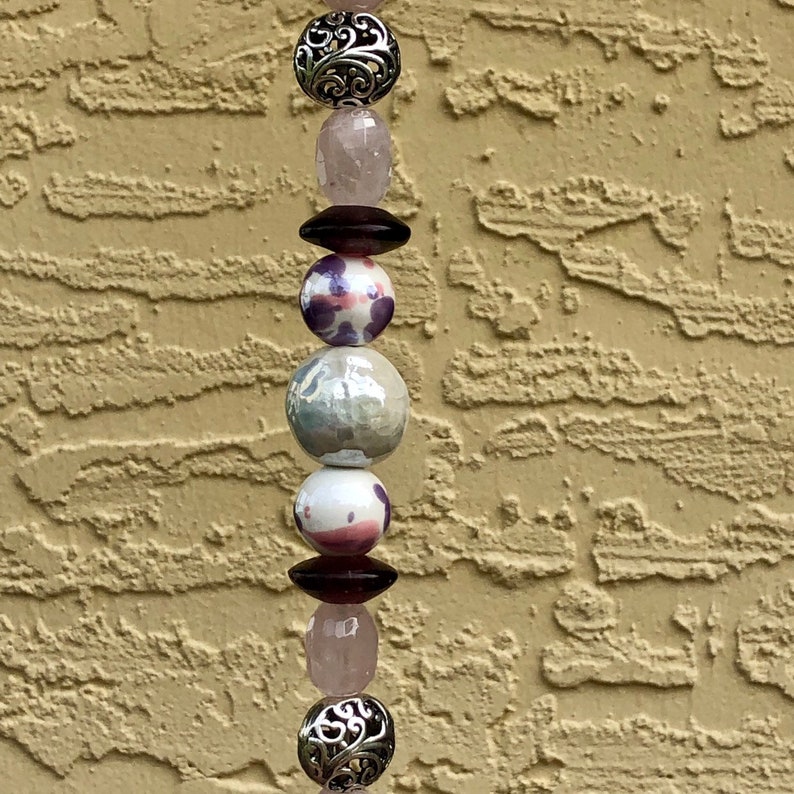 Bohemian Medallion Print Elephant Beaded Wind Chime featuring Lampworked Glass Rose Quartz Transparent Purple and Silver Beads w OM Bell