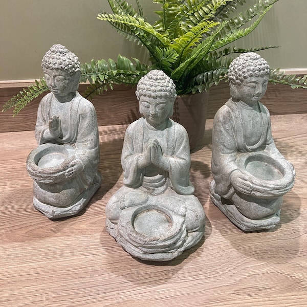 Grey stone Buddha figure. Holds 1x tea light candle. 3 Assorted