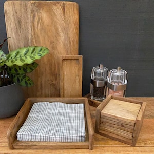 Solid Mango wood napkin holder. Suitable for standard sized (17cm Sq) paper napkins.