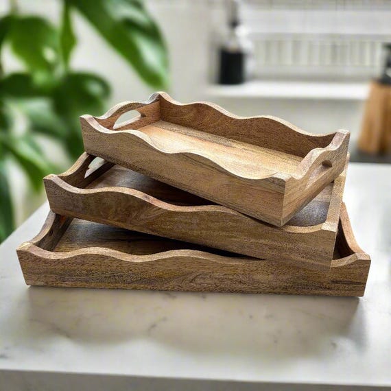 Wavy edge solid Mango wood tray with cut out handles. 3 sizes available. 30x50, 25x45, 20x40cm