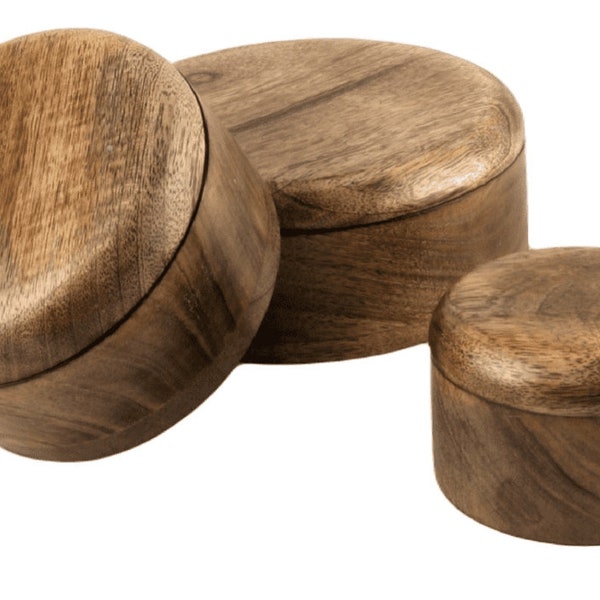 Solid round stained Mango wood lidded boxes. 3 sizes available. 20cm, 15cm and 10cm wide. Ideal for jewellery or little treasures.