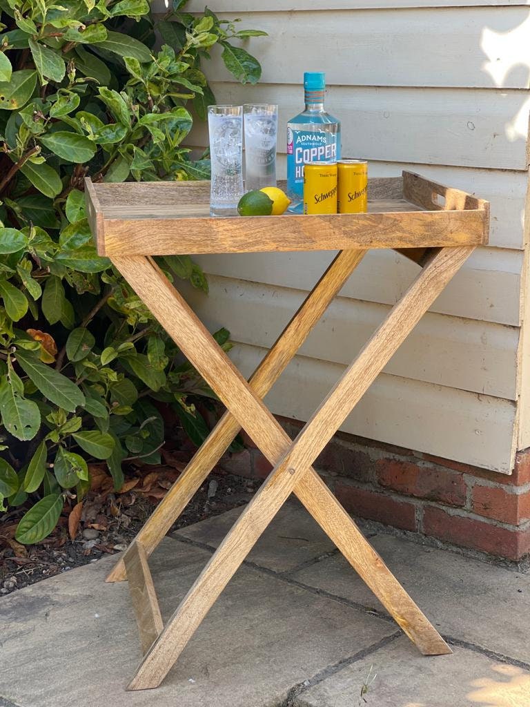 Wooden butlers tray on sale table